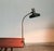 Simple Schwanenhals desk lamp with table clamp by emperor shine. The design language is simple and factual. The umbrella...