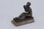 This impressive sculpture titled "Girl with Flowers" dates back to the 1920s, was created in France, and represents an...