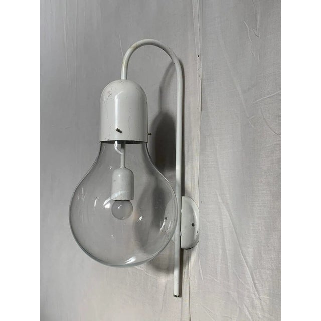 2 Stilux Milano wall sconces proposed individually. 60's model Atlantic. Body in white enamelled metal Important and...