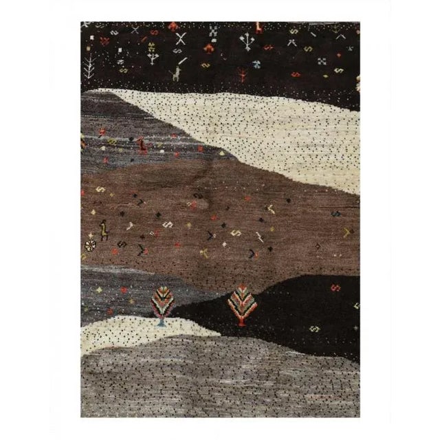 The word “Gabbeh” literally translates to “in the rough,” and it is an accurate description of this style of Persian rug....