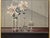 A striking vintage still life from Letterman Gallery, featuring oversized lilies arranged in a glass vase alongside a cut-...