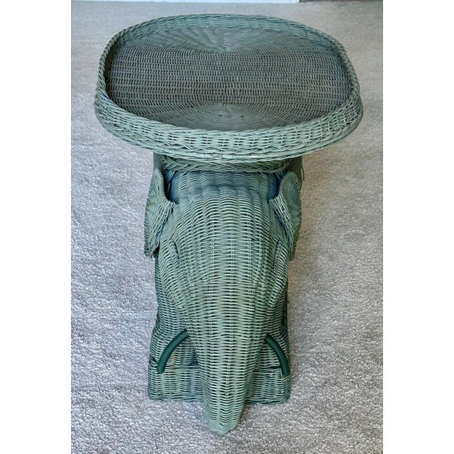 What makes this wicker elephant table is the color green. Very 1960s and hard to find. This table was well taken care of...