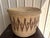 Large-scale vintage coiled basket from Kenya. Typically crafted by the Turkana people using traditional weaving...