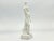 A souvenir from the 1936 Olympic Games. Statue is made out of fine white bisque, the base bears the Olympic Rings, is...