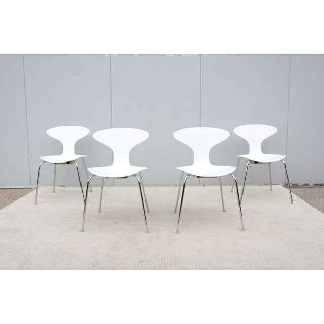 Stunning, authentic set of 4 Orbit armless stacking dining chairs by Bernhardt Design. The Orbit chair, designed by...