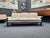 A lovely vintage sofa from the sixties. The design is reminiscent of the Bastiano model by Topia Scarpa. It's upholstered...