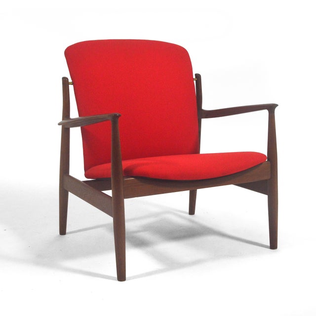 This handsome easy chair by Finn Juhl for France & Sons is a rare model fd141. It shares qualities with many of his famous...