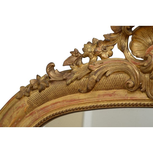 - Antique giltwood mirror - Finely decorated frame - Dating back to the 1890s