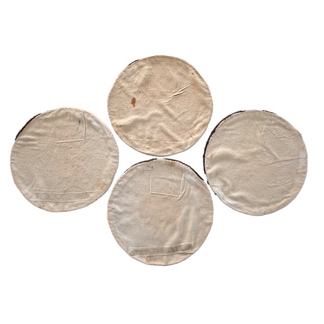 Early 20th C. hand-hooked wool chair pads featuring a patriotic American eagle motif, inspired by the Great Seal of the...