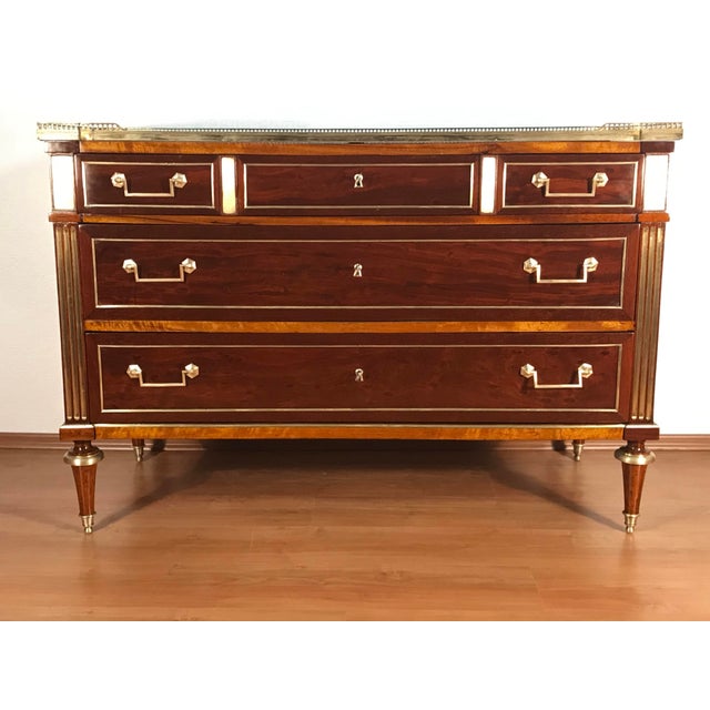 Louis XVI Chest of Drawers, France, circa 1790 Elegant French Louis XVI chest of drawers dating to circa 1790, crafted in...