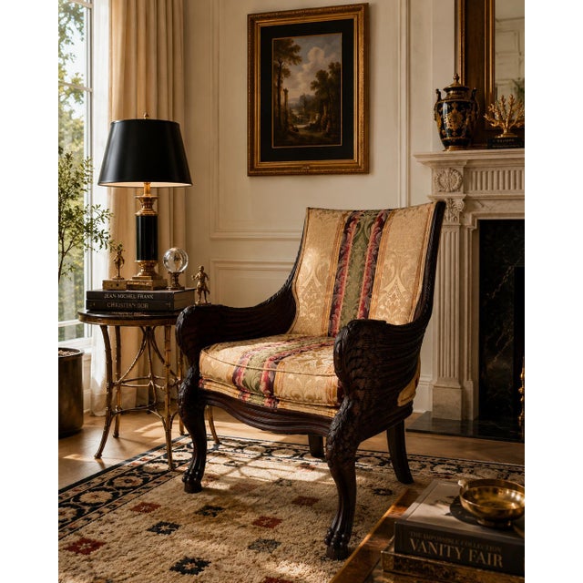A striking Vintage mahogany armchair showcasing exceptional hand-carved craftsmanship inspired by 19th-century French...