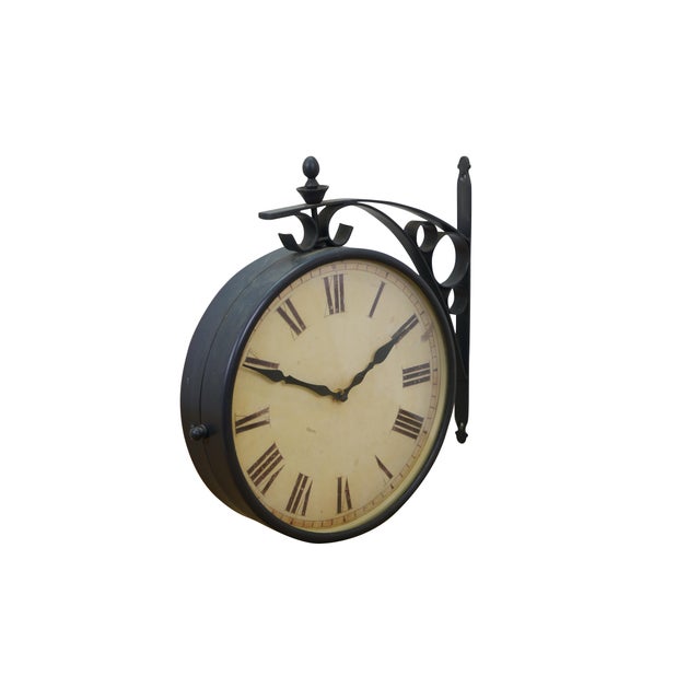 Qty 2 Late 20th century double sided railway clock styled after the famous clock at Victoria Station, London. Wrought...