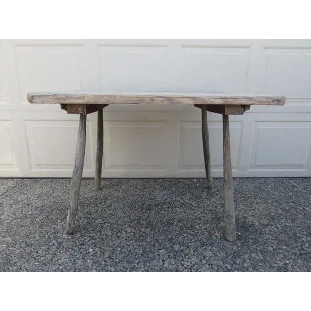 Antique primitive French rustic painted table, c.1850 A folk art work table from the Pyrenees area of France. Having a...
