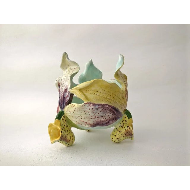 Very rare unique 19th century Majolica orchid cache pot signed Delphin Massier, the three sides have different colors. The...