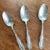 Antique Sterling Spoons 1892 Signed Monogram artist , no case .