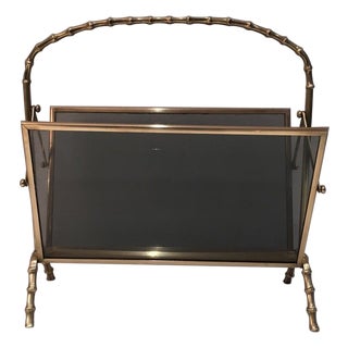1940s Brass and faux bamboo magazine rack with tinted glass panels on each side. French For Sale