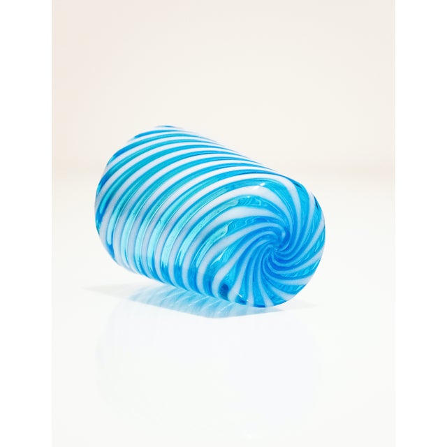 An object that combines function and art. Handcrafted in blown glass according to Venetian tradition, this piece expresses...