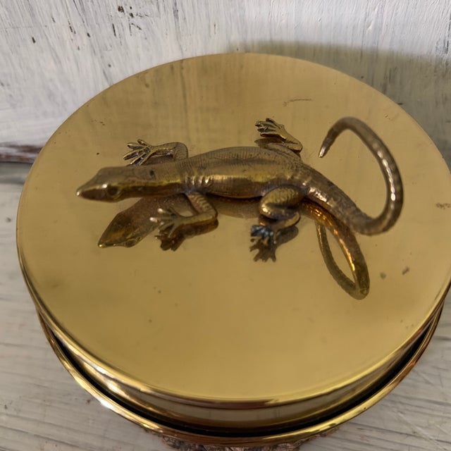 Vintage brass lid and with a lizard on top Bottom made of tree bark and cork Small trinket box fits any room setting