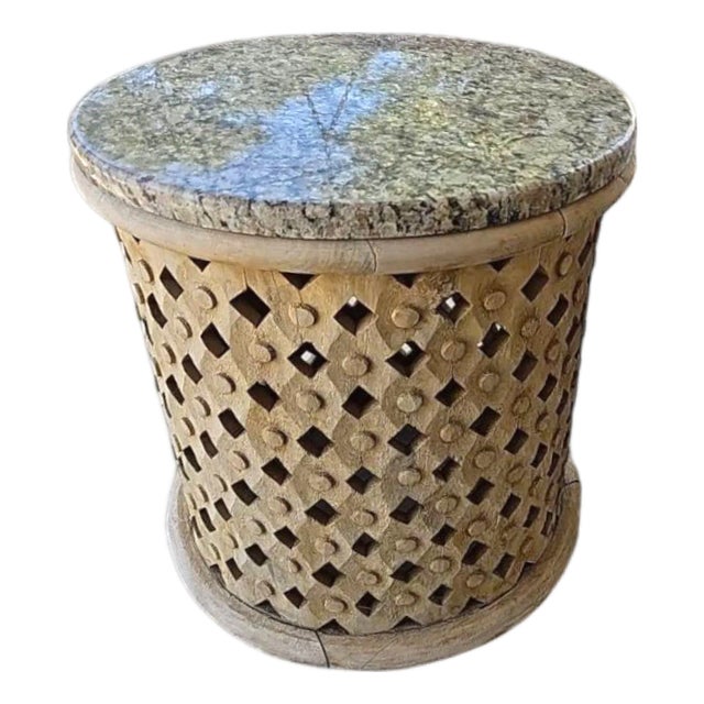 Hand Carved Wooden Drum Shaped Side Table With Lattice Detail and Granite Top For Sale