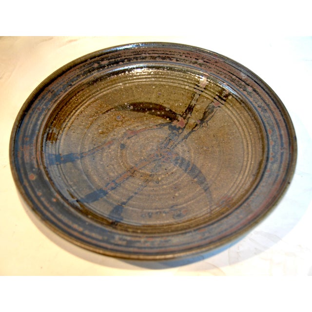 Mid-Century large Studio pottery platter by renowned California artist Eric Norstad (1924-2013). Measures 15.2" diameter,...
