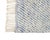 A hypnotic weave of diamonds, radiating outward like ripples on water. This hand-knotted wool rug builds a mesmerizing...