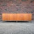 This is a Knoll International by Florence Knoll 4-door low profile teak credenza. It features 8 adjustable shelves and...