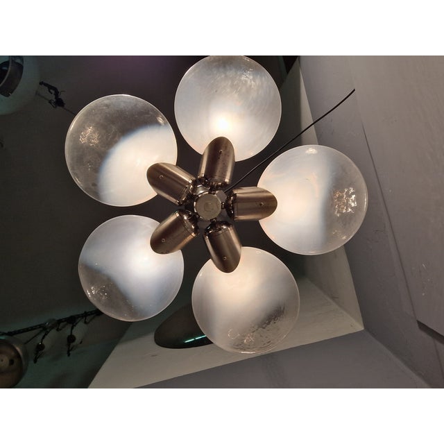 Vintage Pendant Light in Chrome with Five Crushed Glass Shades in the style of Mazzega, 1970s, in Very Good conditions....