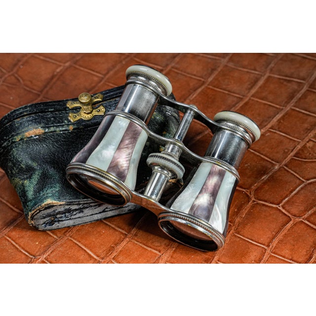 Experience the elegance of a bygone era with this stunning pair of Le Maire Paris French antique opera glasses. Recognized...