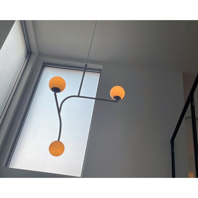 Authentic Pholc Mobil 70 pendant designed by Monika Mulder in Matte Nickel with Opal glass. A sculptural Scandinavian...