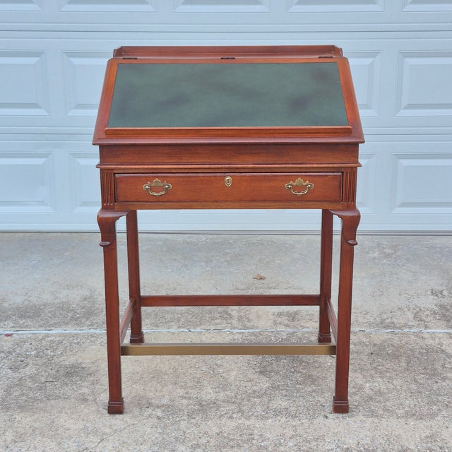 This is a rare and wonderful architect’s table or standing writing desk from Lexington’s discontinued Arnold Palmer Home...