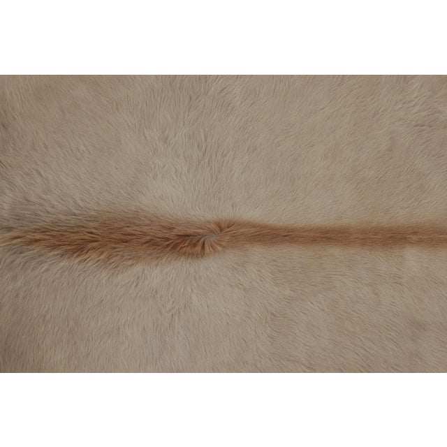This handmade 7x8 contemporary cowhide rug from Rug & Kilim represents an exciting new collection of rare large-size...