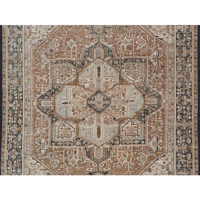 Persian Antique Heriz Rug with Geometric Design in Blue's, Tan, Cream, and Brown. Keivan Woven Arts / rug V21-0120,...