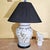 A beautifully crafted Chinese Chinoiserie style porcelain table lamp featuring a hand-painted and raised floral motif in...