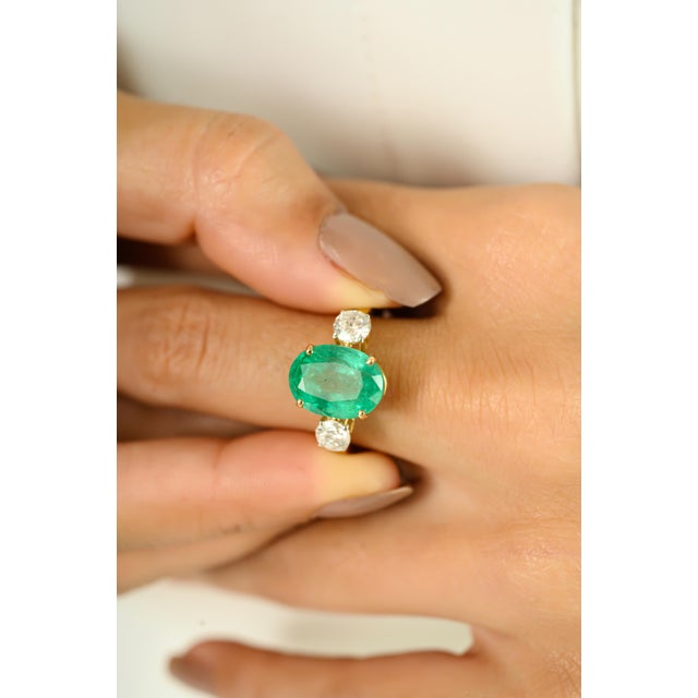 Radiate timeless elegance with this exquisite ring, crafted in luxurious 14K solid yellow gold. Featuring a stunning...