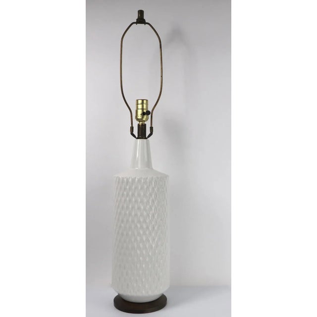 Unusual Blanc de Chine glaze Modernist table lamp, with cross hatch patterned surface, on turned walnut base. Stylish,...