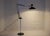 Large foot lamp, adjustable, edition of the 70s in the taste of Anvia H max 176 x W (= arm) 66 cm x D 28 cm (= reflective...