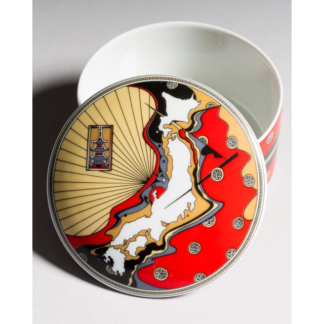 A decorative porcelain lidded box designed by kathy still for rosenthal studio-linie, titled "a visit to japan." the...