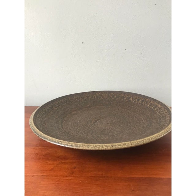 Signed and dated on the bottom. We love the brutalist texture of the glaze!