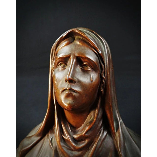 Oscar Ruffony (1874-1946) Bust of the Virgin Mary in Tears, Spelter on Marble, Art Deco Celebrate your faith with this Art...