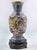 Vintage Chinese vase early 20th century Ceramic and metal on a wooden base. Measures: 31x13 cm.