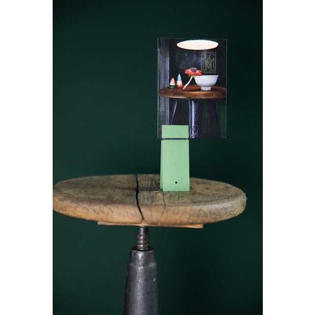 Original vintage cast iron work stool, once used by a machine operator. The simple swivel mechanism of the three-legged...