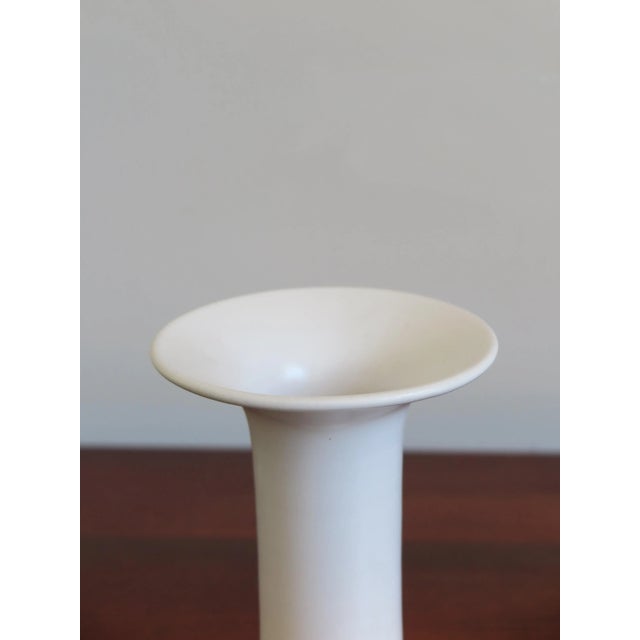 White vase designed and engineered by Italian artist Franco Bucci, Pesaro; glazed ceramic, marked with graphic symbol...