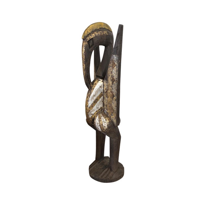 Superb vintage African Senufo Bird (Hornbill) Statue, hand-carved from a single piece of wood. 22.5" H × 6"w by 6" D...