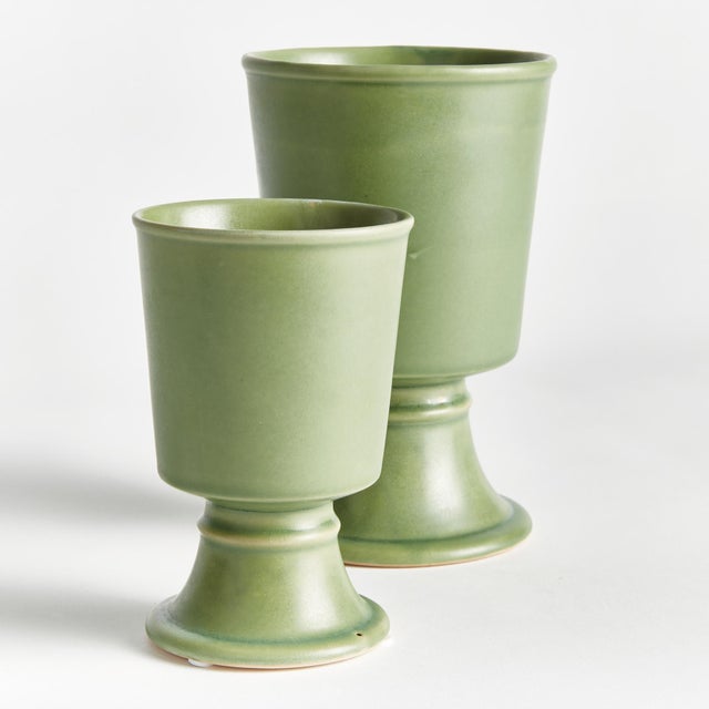 With traditional forms and footed base, these cachepots are classic silhouettes. What makes these pots unique is the deep,...