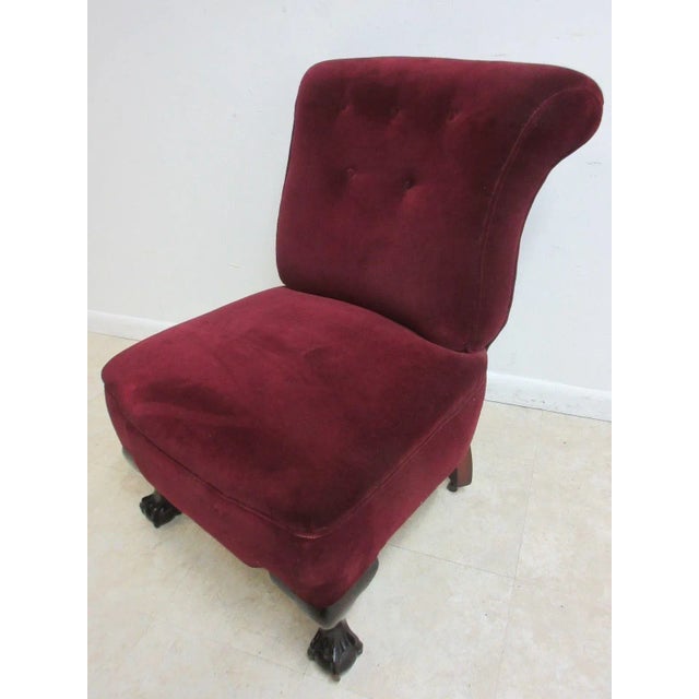 An Vintage Chippendale ball and claw mohair chair. Great shape. tight and sturdy..Minor scratches and rub marks. minor...