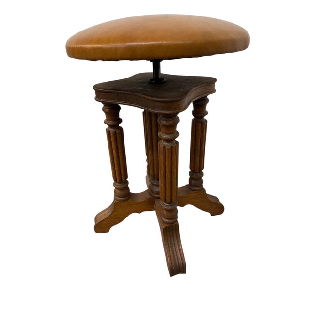 Elevate your space with this elegant antique Victorian oak piano stool, beautifully crafted with classic late 19th-century...