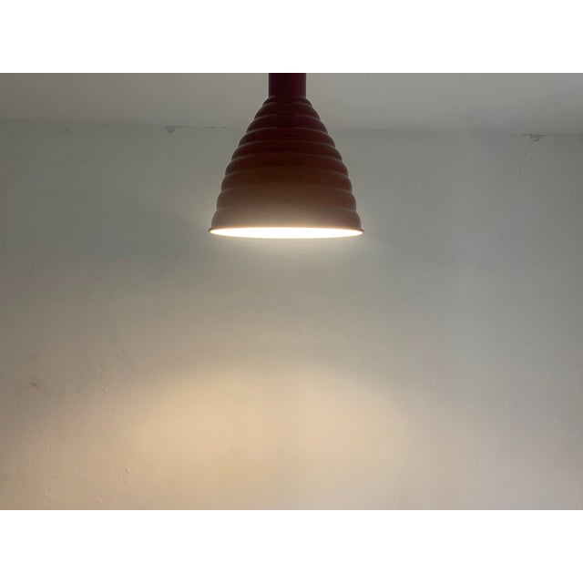 Original vintage pendant light manufactured by Sijaj Hrastnik in former Yugoslavia, circa 1970s. The lamp features a...