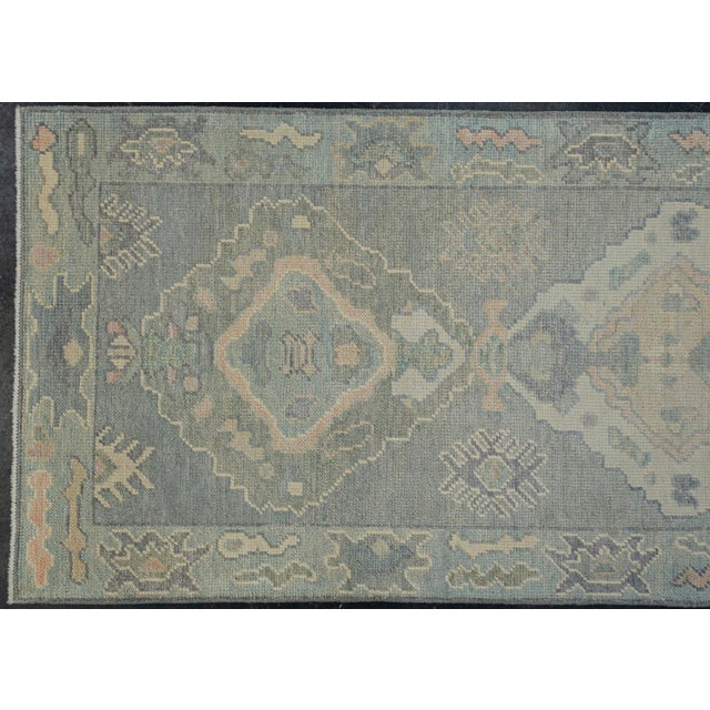 Turkish Oushak Rug Soft Blue & Green Geometric Handwoven Wool Rug 2'8" X 9'1" This handwoven Turkish Oushak rug features...