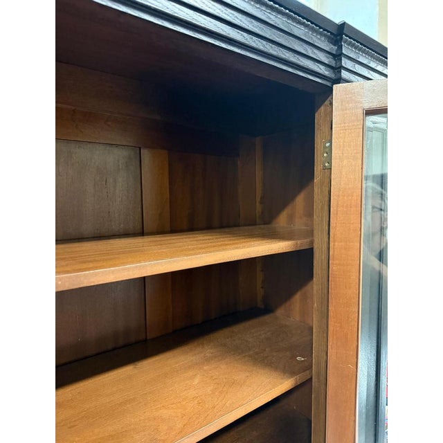 Original Art Nouveau bookcase, circa 1910 (No. 2604) Wood type: Oak Color: Black stained, hand-polished with shellac...