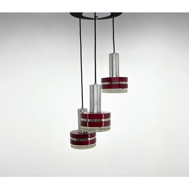 Mid-Century cascading lighting from Italy. Good vintage condition. Bulbs: 3 x E 14. Up to 250V (Europe/UK Standard).The...